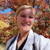 Dr. Sydney Hewitt with a patient